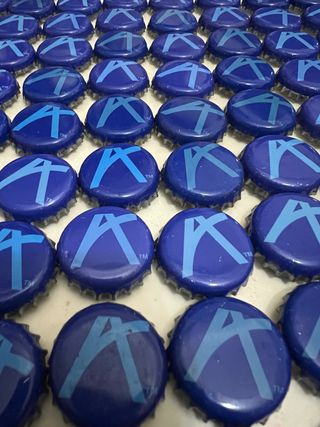 Lote 100 chapas refresco Aquarius