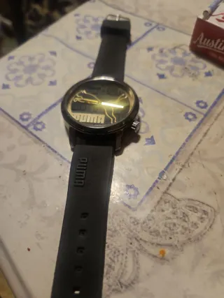 Reloj Puma Negro y Dorado