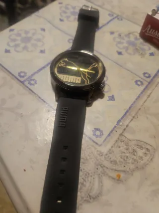 Reloj Puma Negro y Dorado
