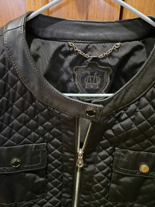 Cazadora Massimo Dutti acolchada negra T.XS