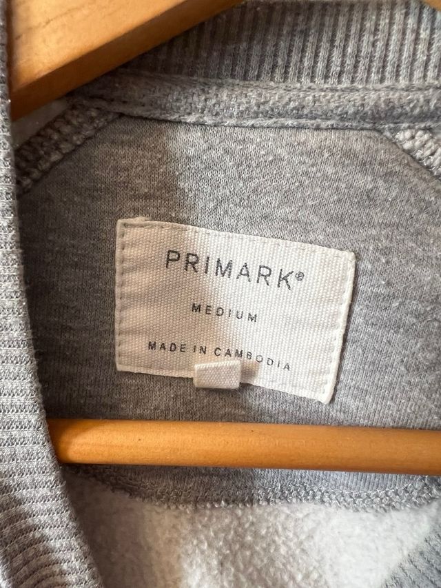 Sudadera gris con estampado REALITY