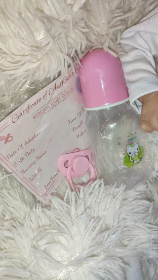 Bambola Reborn femmina con ciuccio e biberon