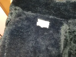 Giaccone nero con pelliccia interna