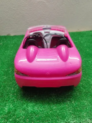 Coche de juguete rosa para muñecas