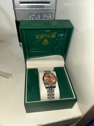 Reloj Rolex Oro y Rojo