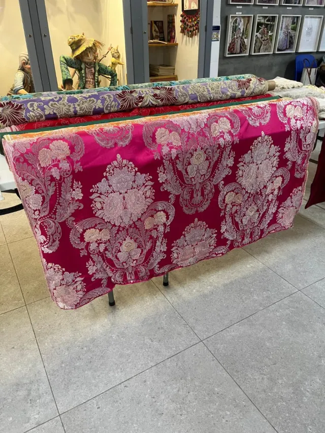 Telas de fallera rosa y morada azul naranja verde