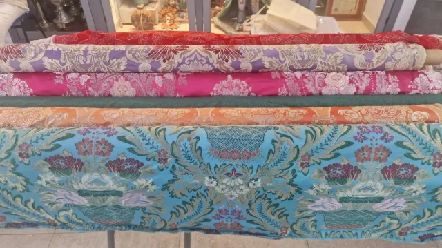 Telas de fallera rosa y morada azul naranja verde