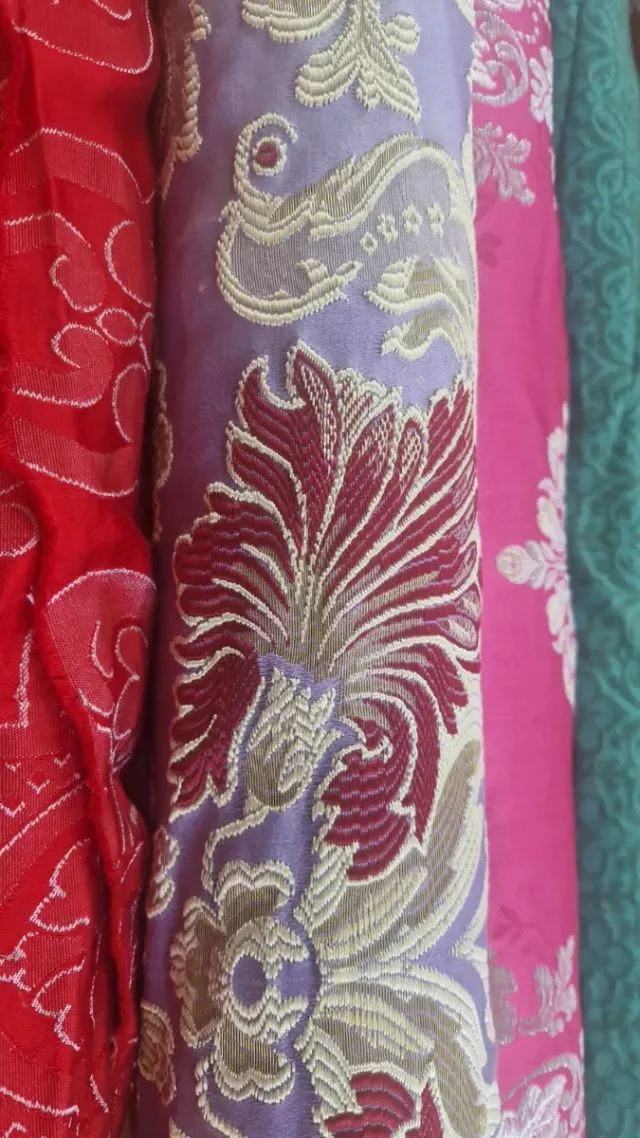 Telas de fallera rosa y morada azul naranja verde