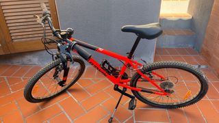 Bicicleta Montaña Decathlon 24 pulgadas Roja.