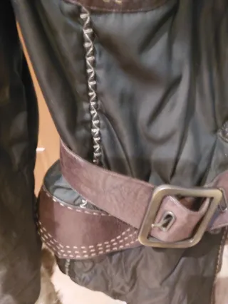 Giaccone con pelliccia e dettagli in pelle