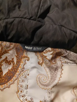 Giaccone con pelliccia e dettagli in pelle