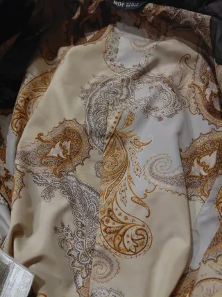 Giaccone con pelliccia e dettagli in pelle