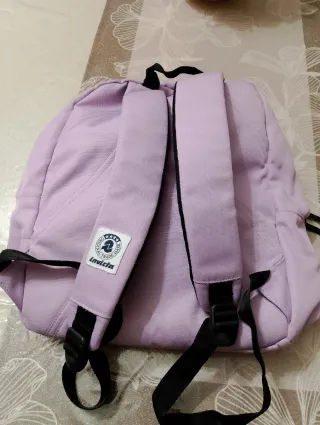 Zaino Invicta lilla con occhi e labbra