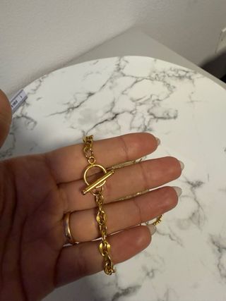 Bracciale con chiusura a T dorato