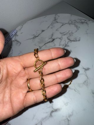 Bracciale con chiusura a T dorato