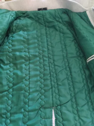 Giubbotto uomo beige con stemma