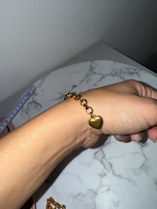 Bracciale con ciondolo a cuore dorato
