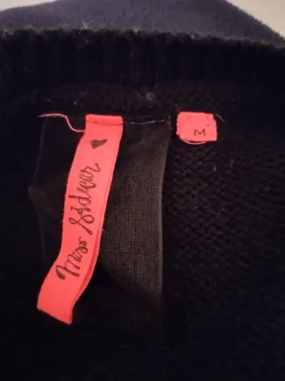 Jersey mujer negro y gris con flecos