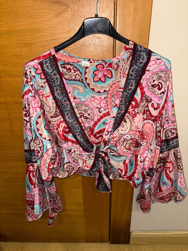 Blusa estampada manga larga