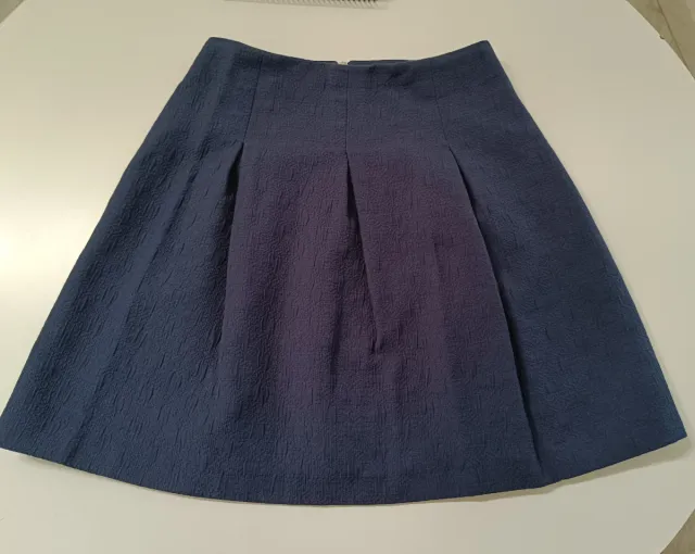 Falda azul Formula Joven