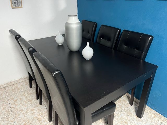 Mesa de comedor negra con 6 sillas