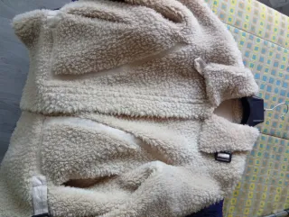 Giaccone donna effetto lana con cinturini