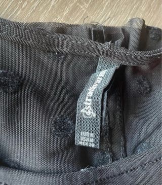 Blusa negra plumeti Stradivarius