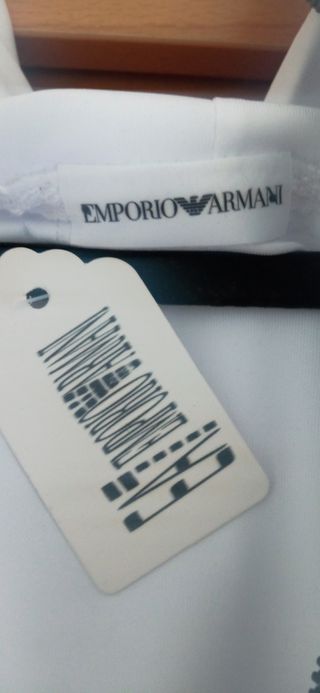 Chándal EA7 Negroy Nik escucho ofertas