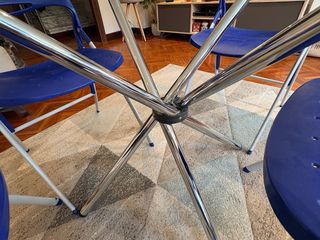 Conjunto de mesa redonda cristal y sillas plegable