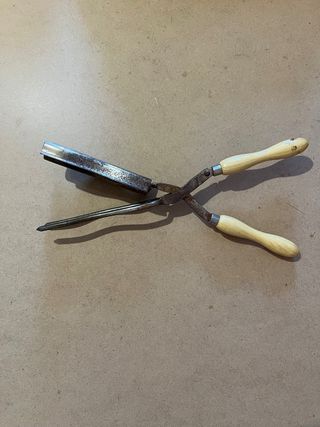 Tenacilla rizador antigua