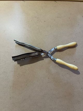 Tenacilla rizador antigua