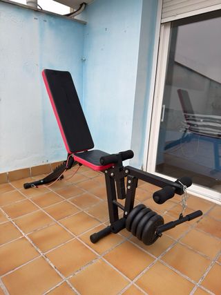 Banco de pesas con discos y pesas