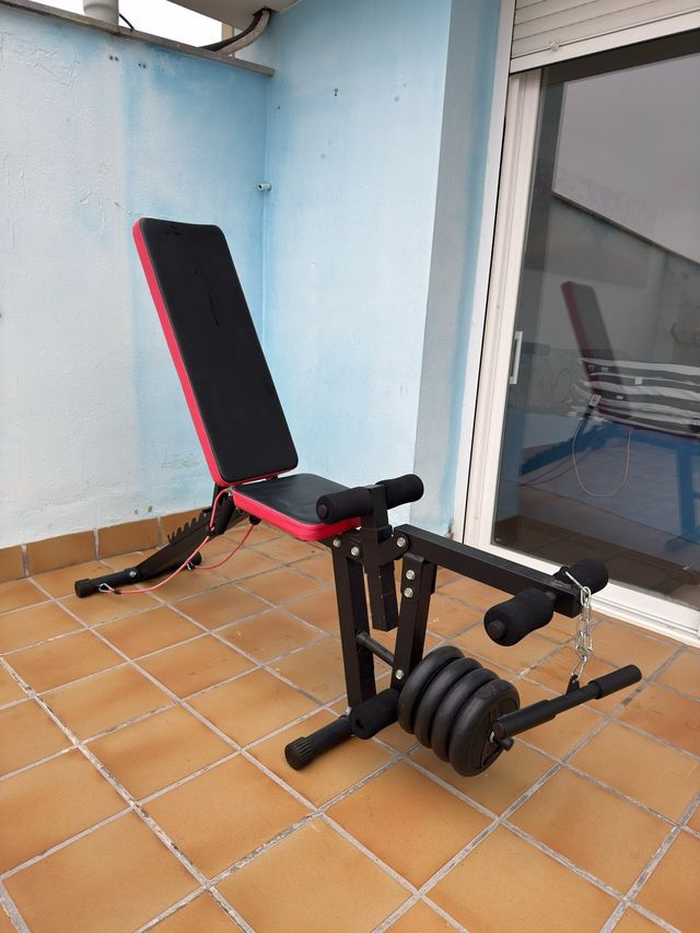 Banco de pesas con discos y pesas