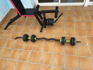 Banco de pesas con discos y pesas