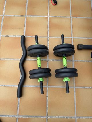 Banco de pesas con discos y pesas