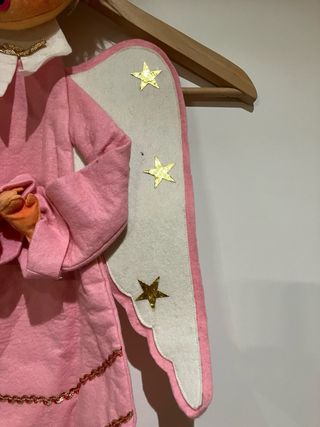 Angelo decorativo rosa con stelle