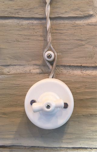 Interruptor giratorio antiguo de porcelana