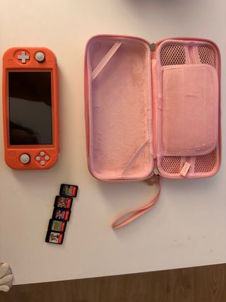 Nintendo Switch Lite Rosa + Custodia + 5 Giochi