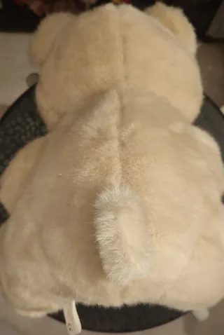 Urso de peluche com laço xadrez