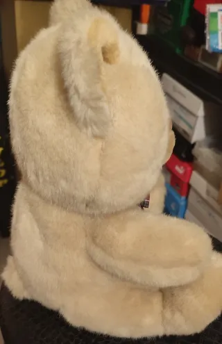 Urso de peluche com laço xadrez