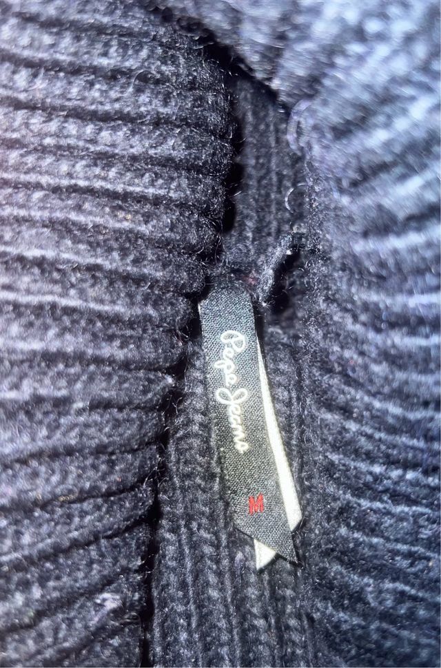 Jersey de cuello alto con trenzas