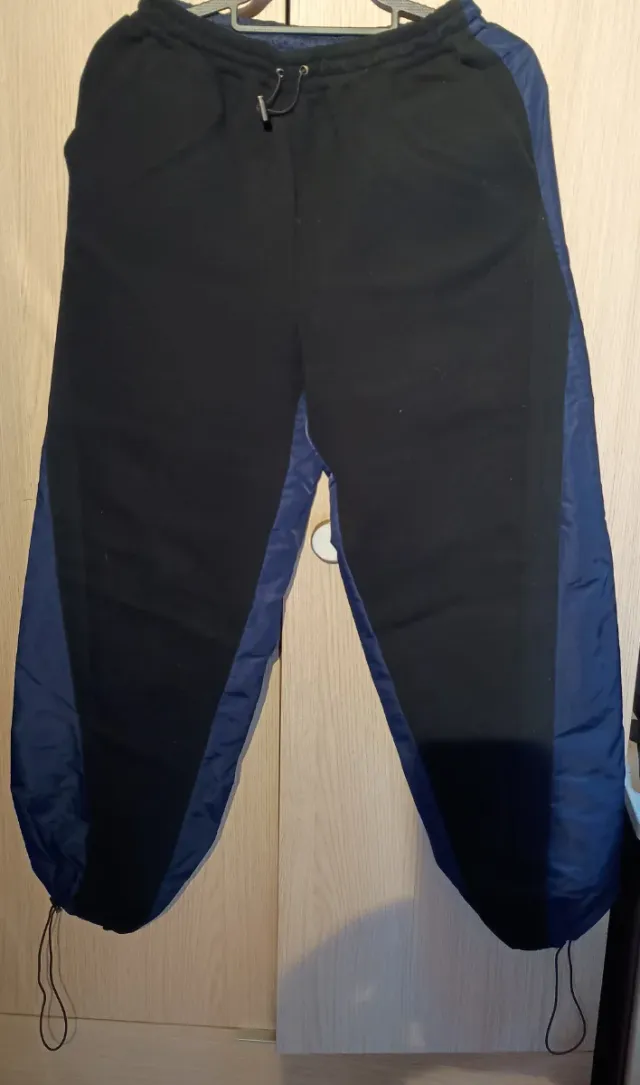 Pantalón chándal dos tejidos negro/azul