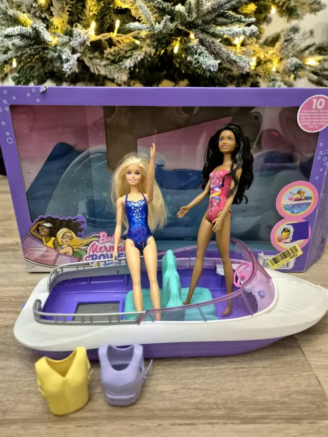 Barbie yate con muñecas