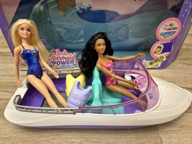 Barbie yate con muñecas