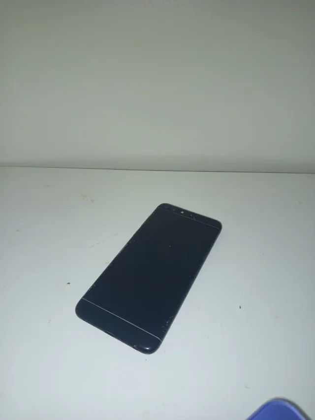 Lotto di 3 telefoni cellulari usati