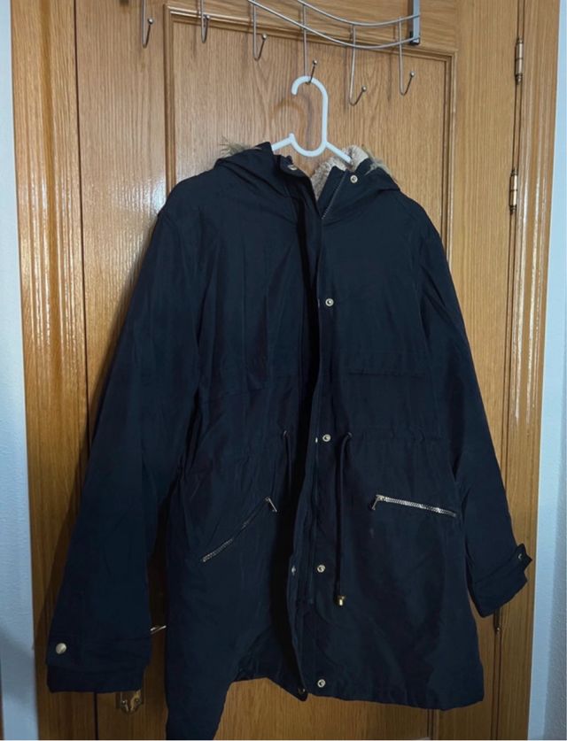 Abrigo azul con capucha Primark