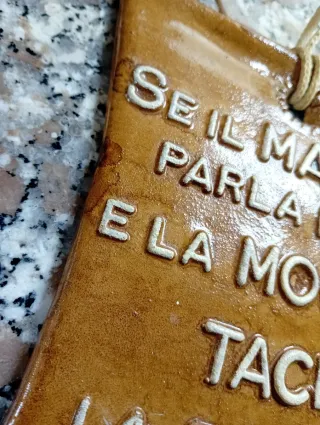 Quadretto umoristico Se il marito parla bene