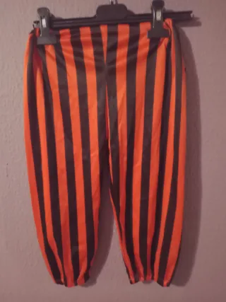 Pantalones de disfraz rayas naranja y negro