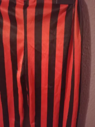 Pantalones de disfraz rayas naranja y negro