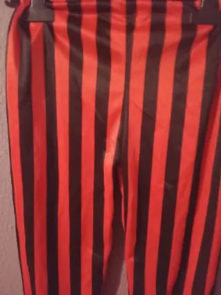 Pantalones de disfraz rayas naranja y negro